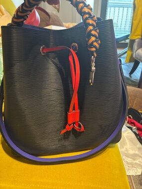 Like new Authentic Louis Vuitton
Epi Braided Neonoe MM Navy